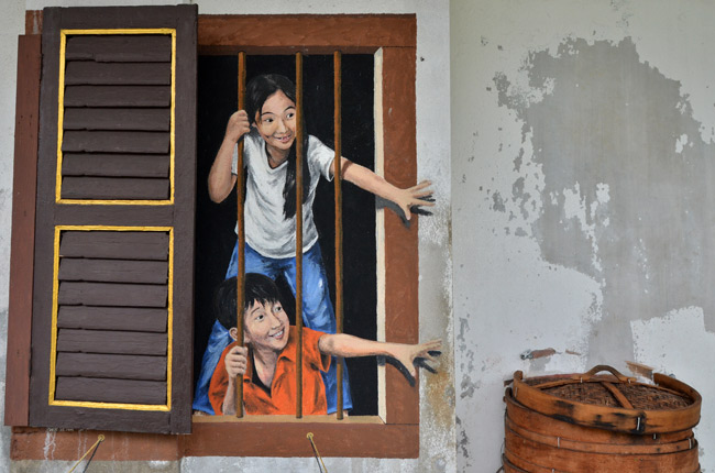 Niños dibujados en la pared, Street Art (Penang, Malasia)
